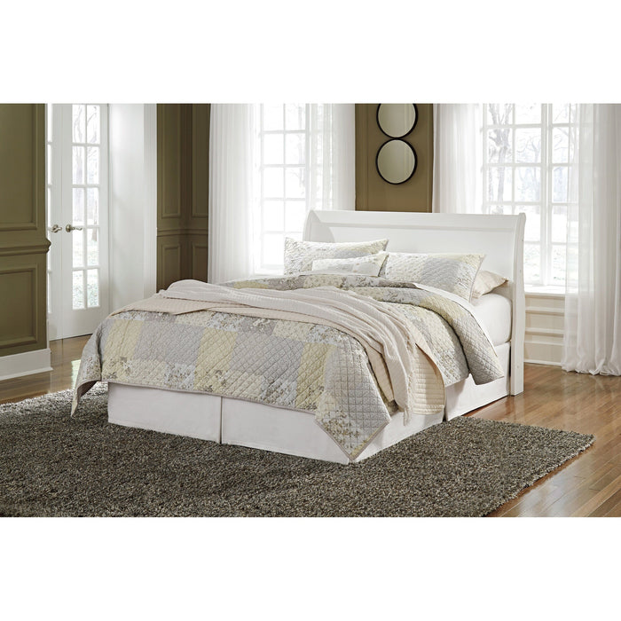 A room setting featuring Anarasia White Queen Sleigh Headboard